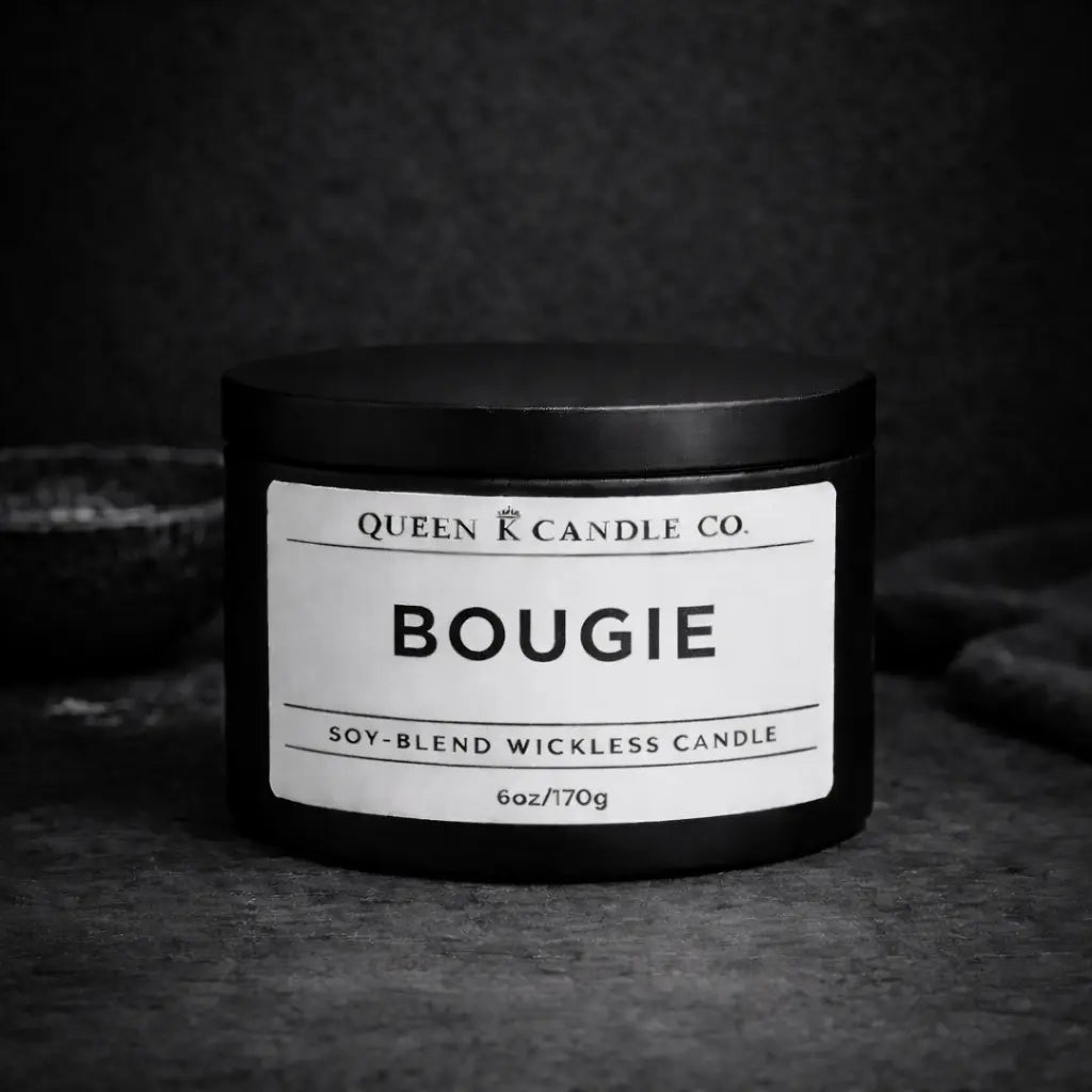 black candle tin labelled Bougie 