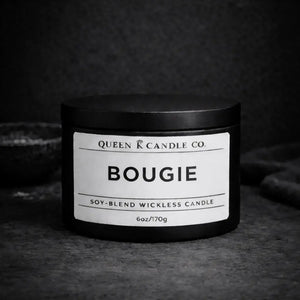black candle tin labelled Bougie 