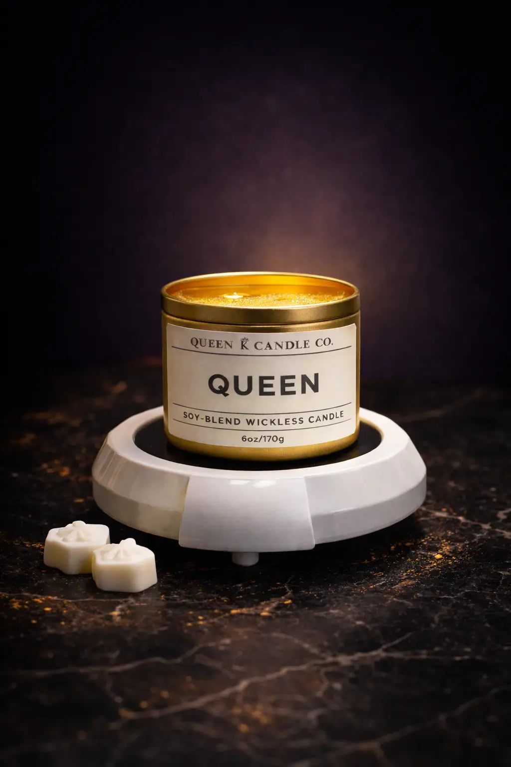 gold candle tin labelled Queen