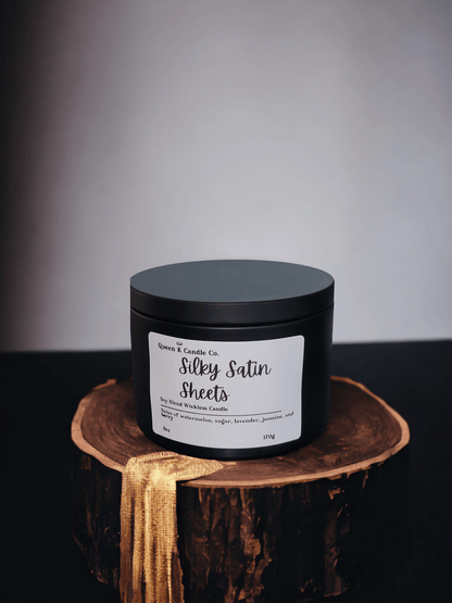 silky satin sheets candle