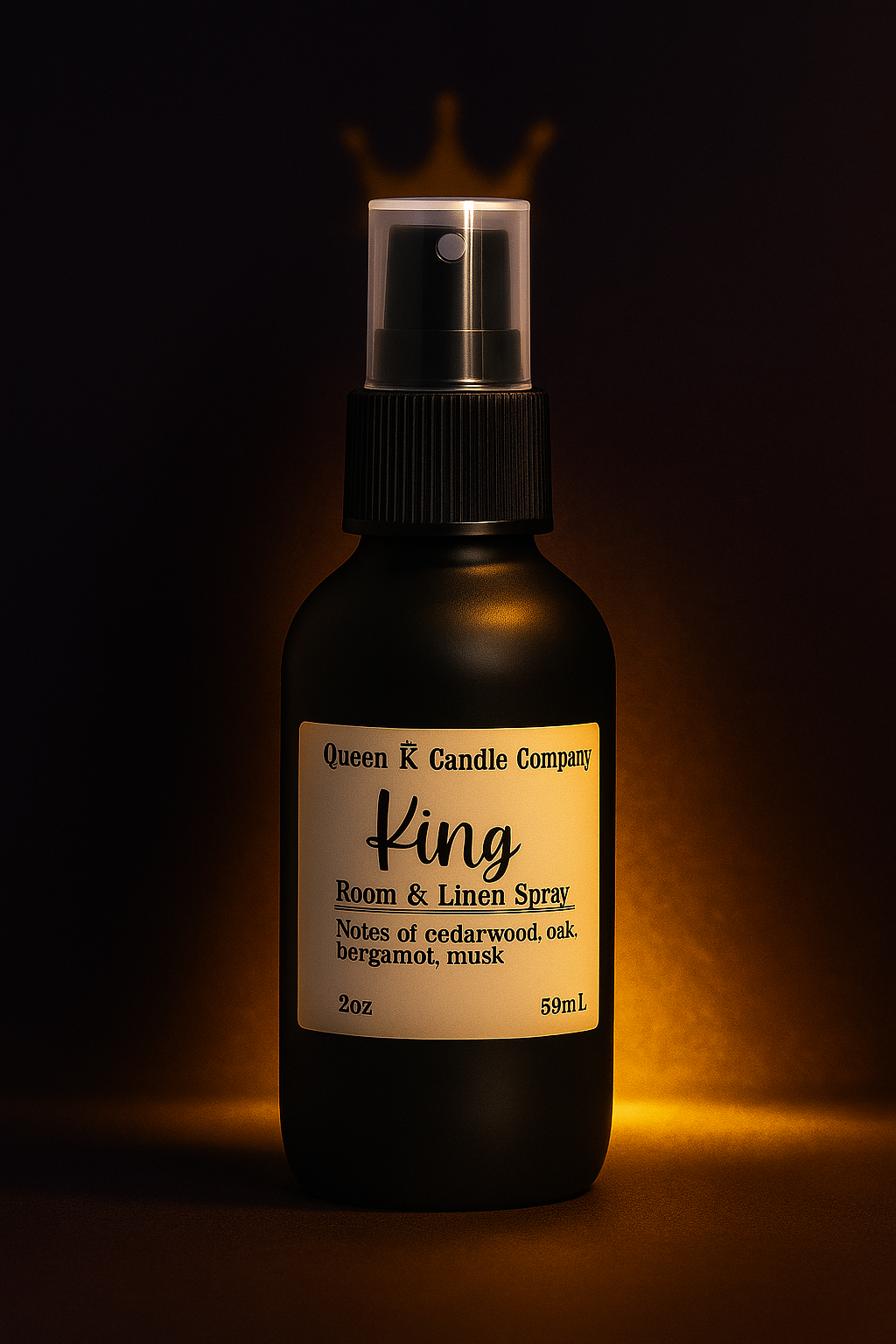 Bottle of Queen K Candle Company King Room & Linen Spray with a dark background