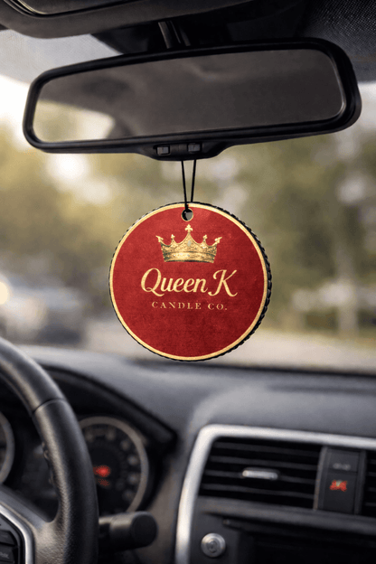 Car air freshener hanging from a car's rear view mirror.
