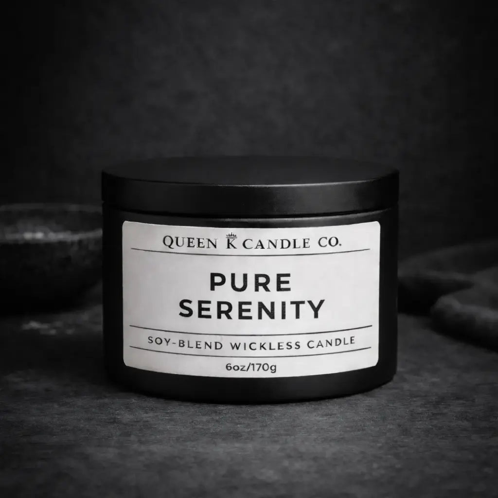 black candle tin labeled Pure Serenity