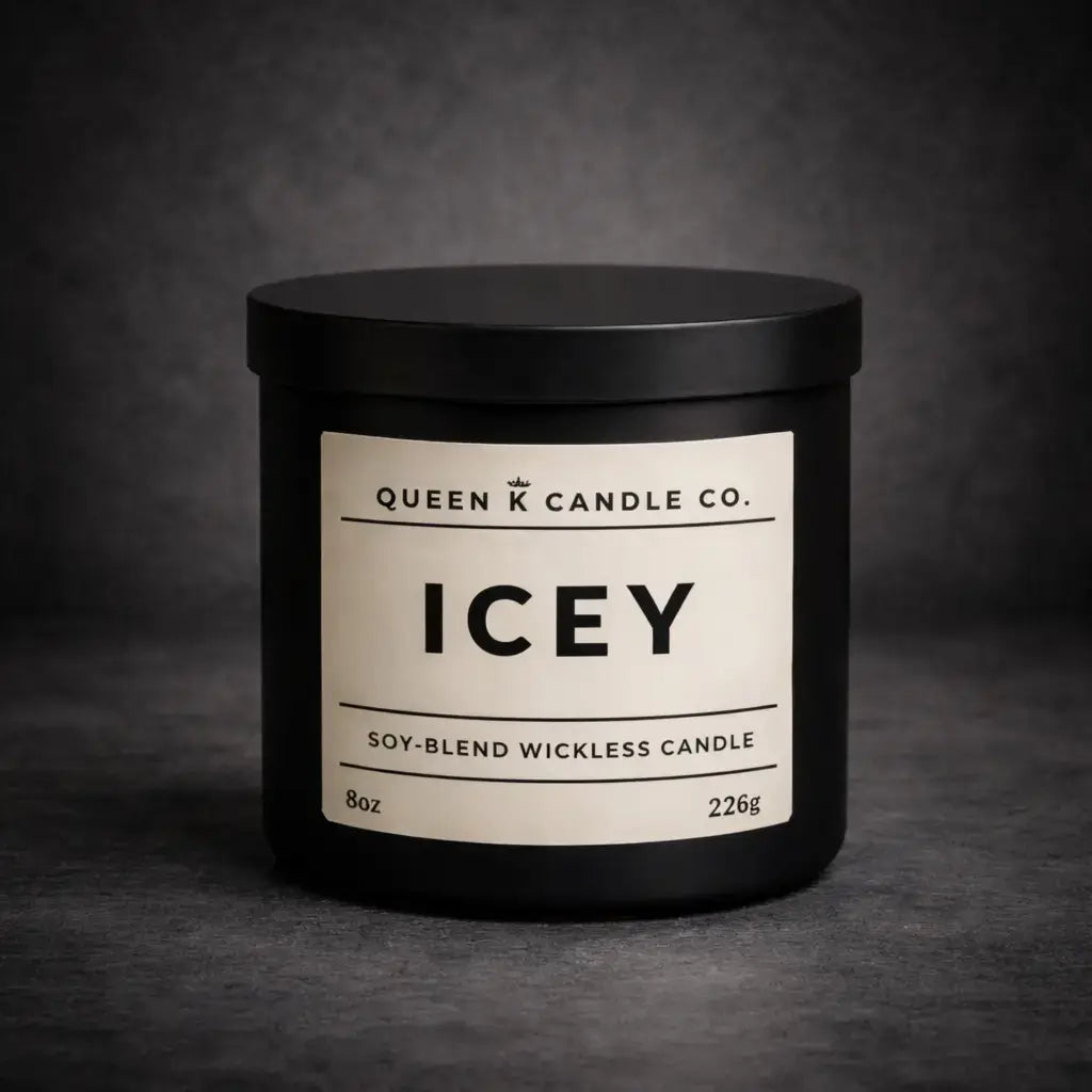 Black candle jar with 'Queen K Candle Co.' label on a dark background