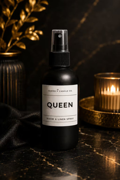 bottle of room and linen spray labelled Queen