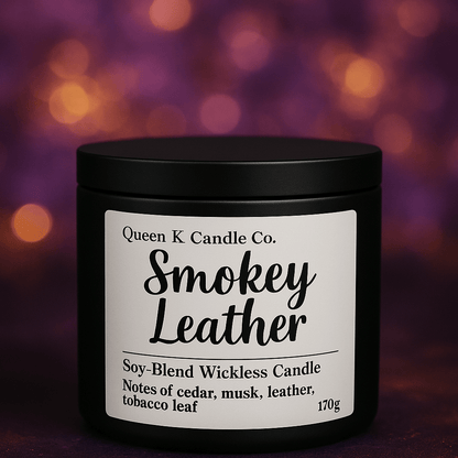 Black candle jar with 'Smokey Leather' label against a blurred purple and orange background