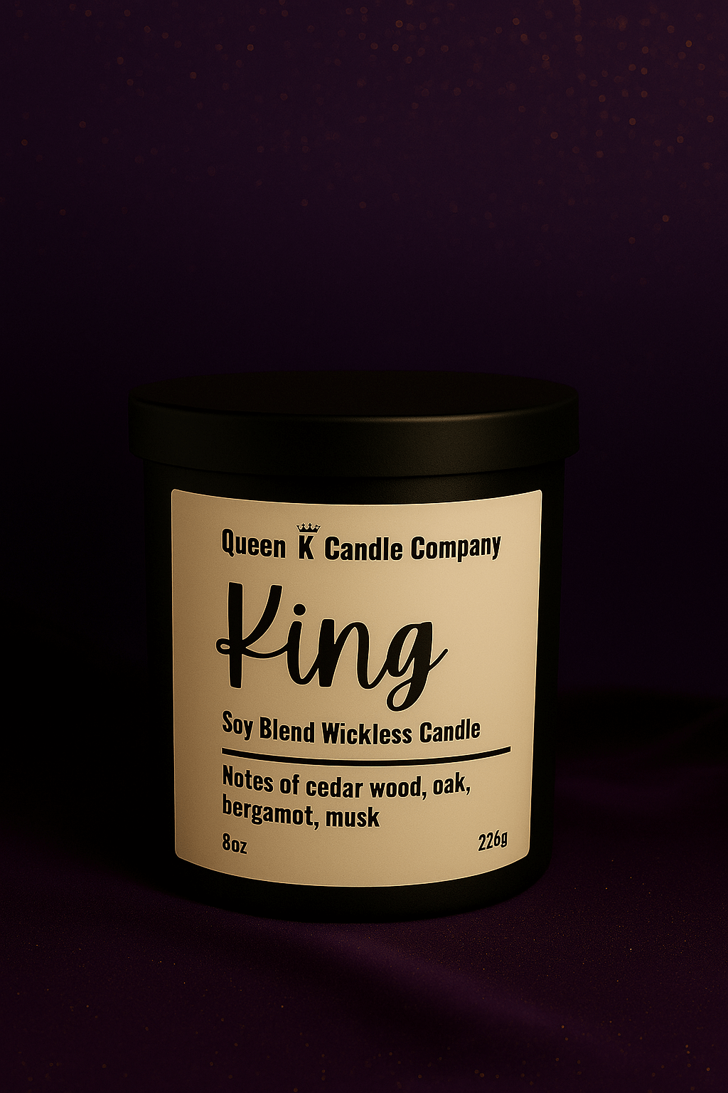 Candle with 'Queen K Candle Company' label on a dark background