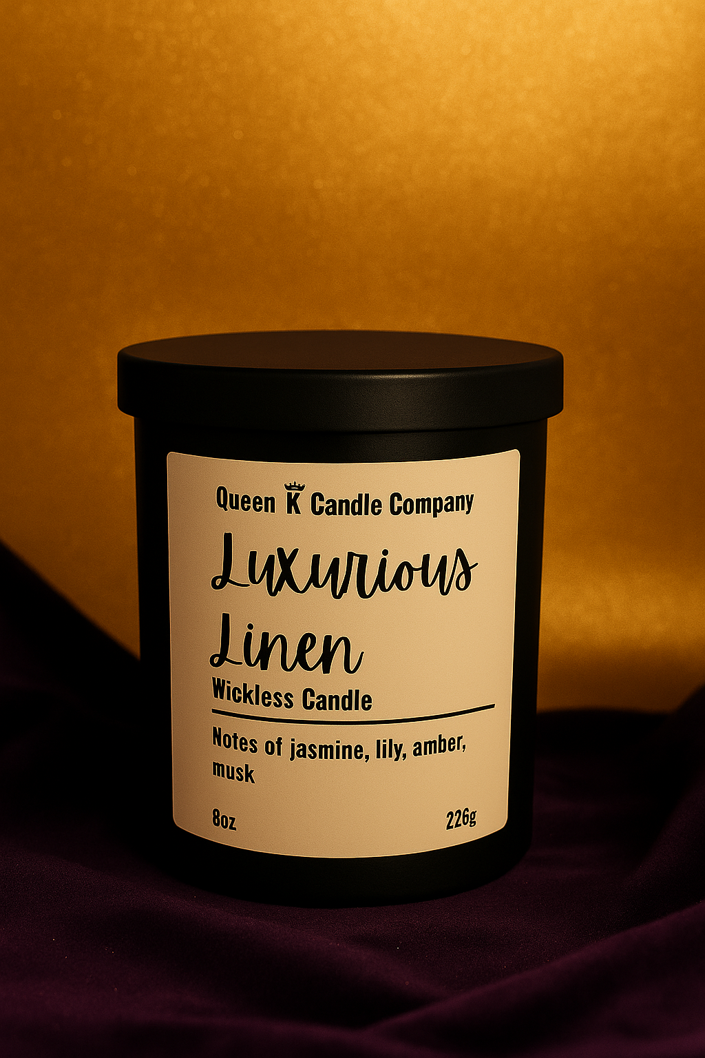 Wickless candle from Queen K Candle Company with a label on a dark background