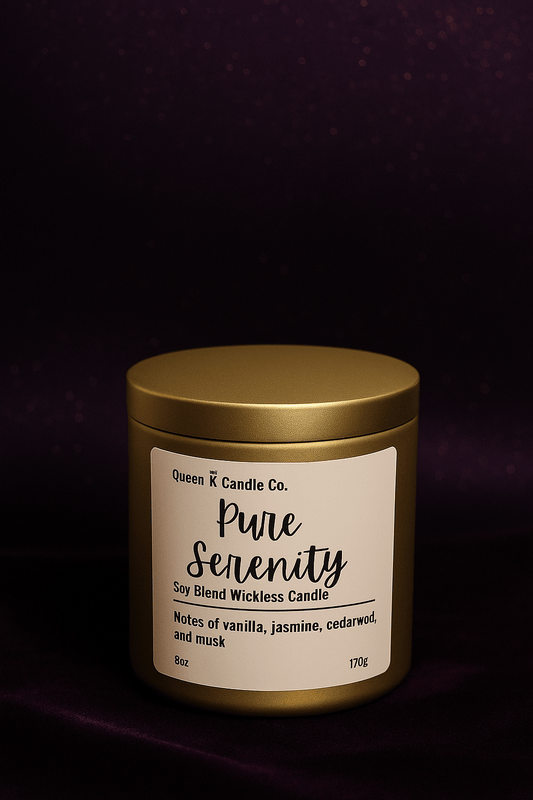 Candle jar labeled 'Pure Serenity' by Queen K Candle Co. on a dark background