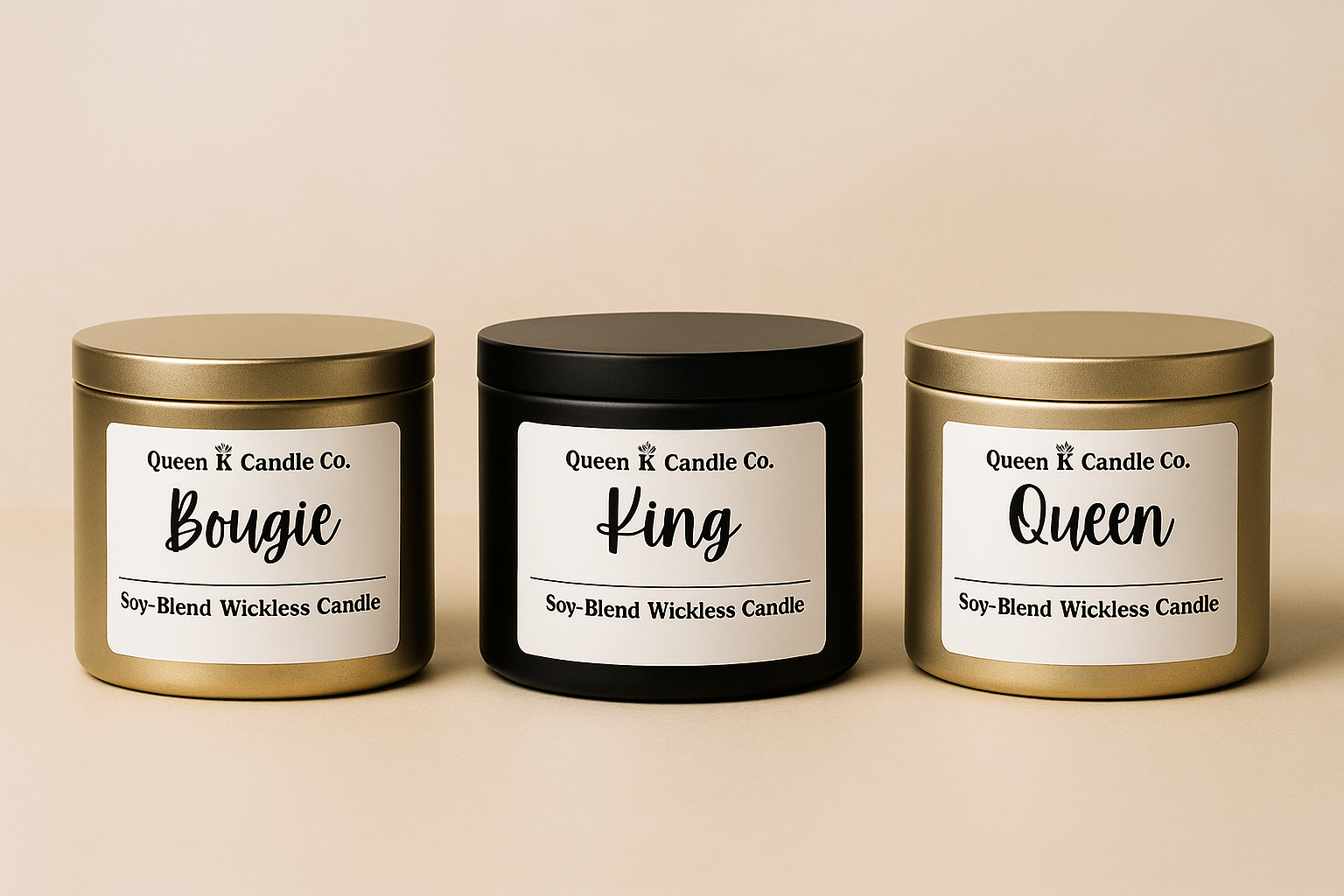 Three candles from Queen K Candle Co. with labels on a beige background