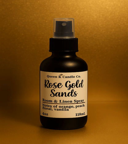 Black room & linen spray bottle with a label on a gold background